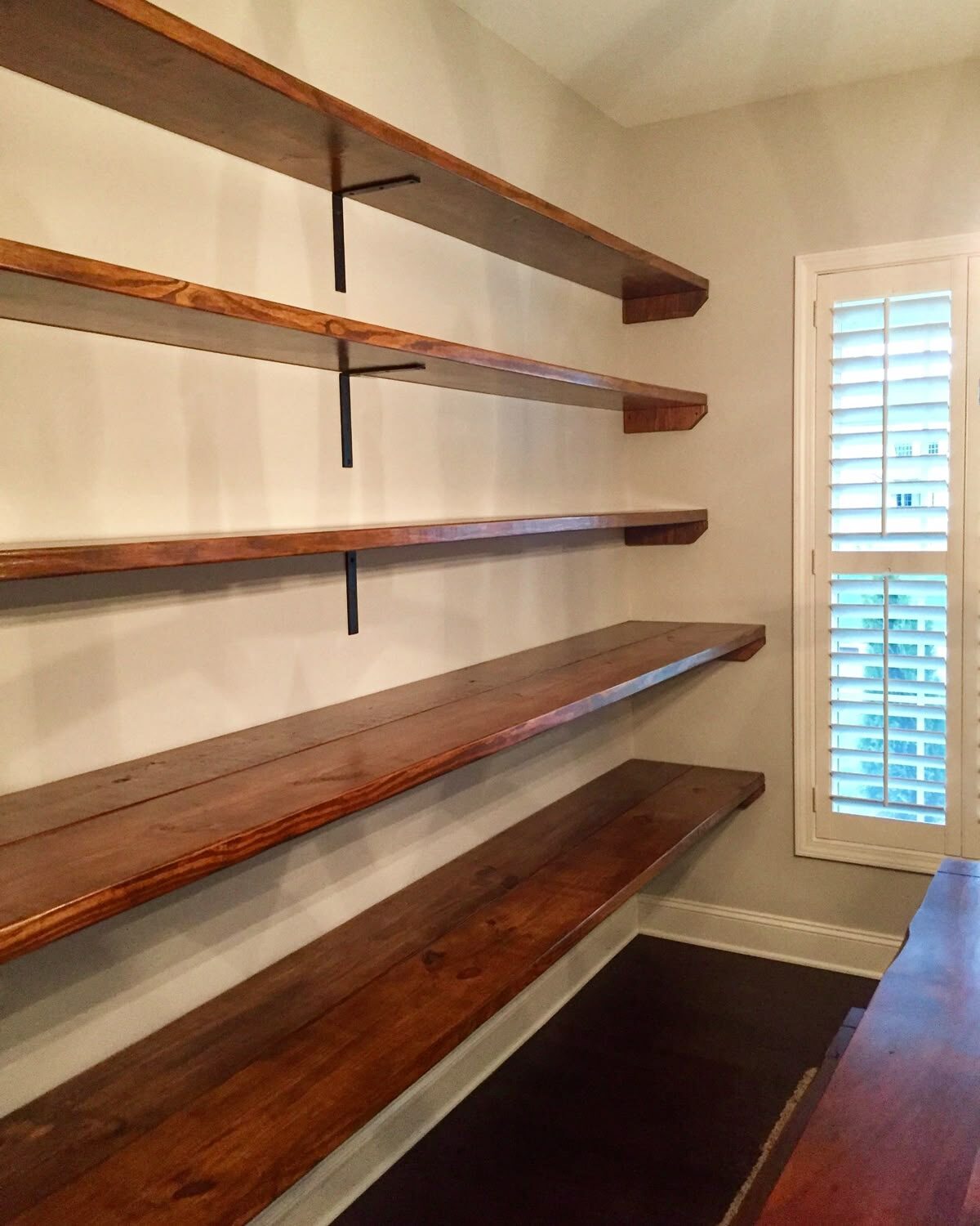 Custom stained wood pantry shelving
